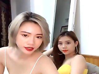 The two girls rewarding dude by sucking